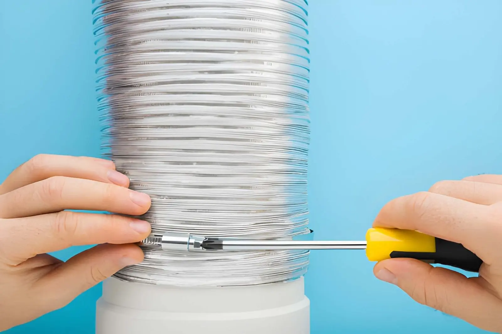 Skilled technician performing expert Dryer Vent Installation in a residential home.